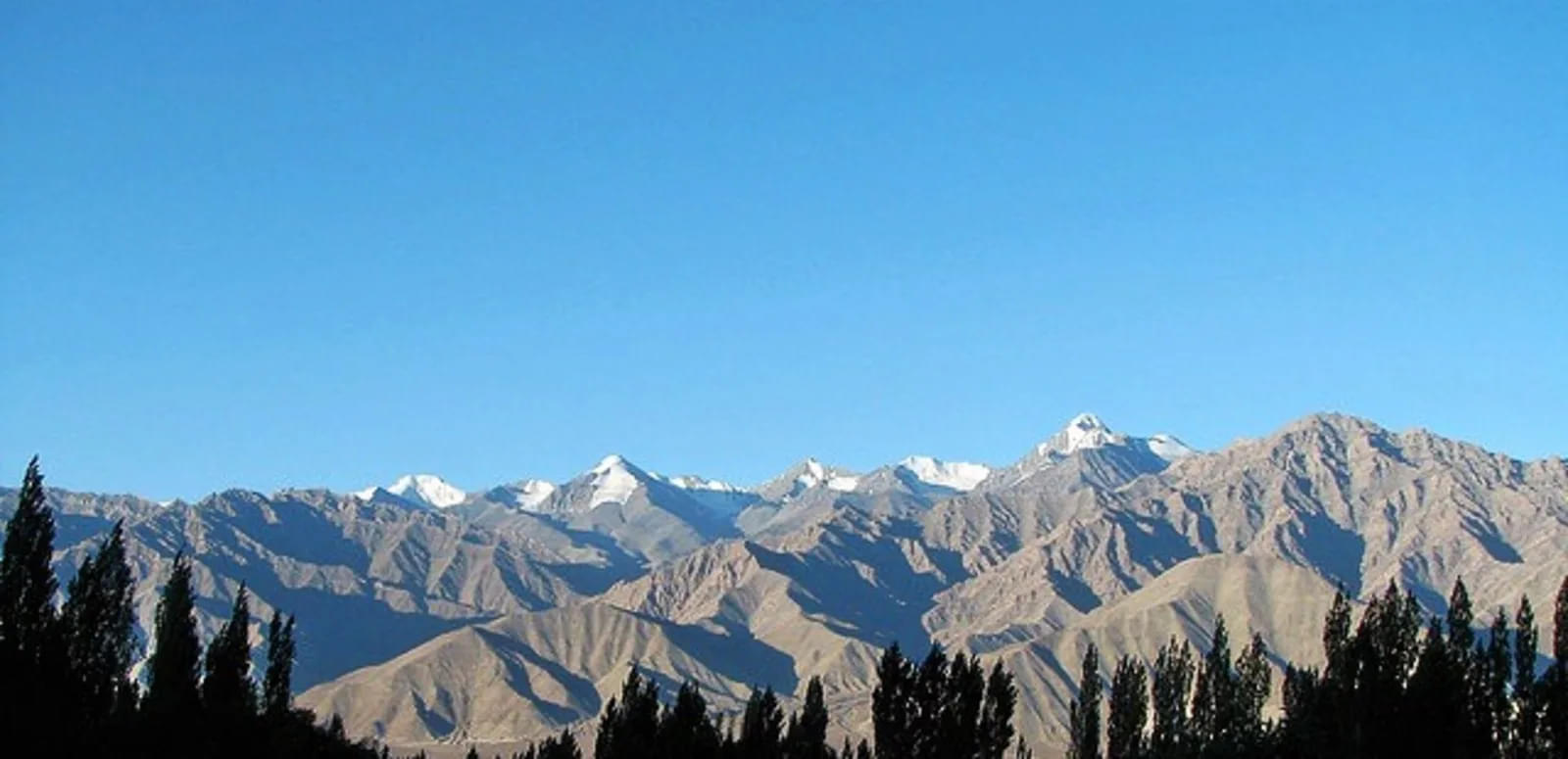 Bask in the warm sunshine and admire the stunning vistas of the Himalayas