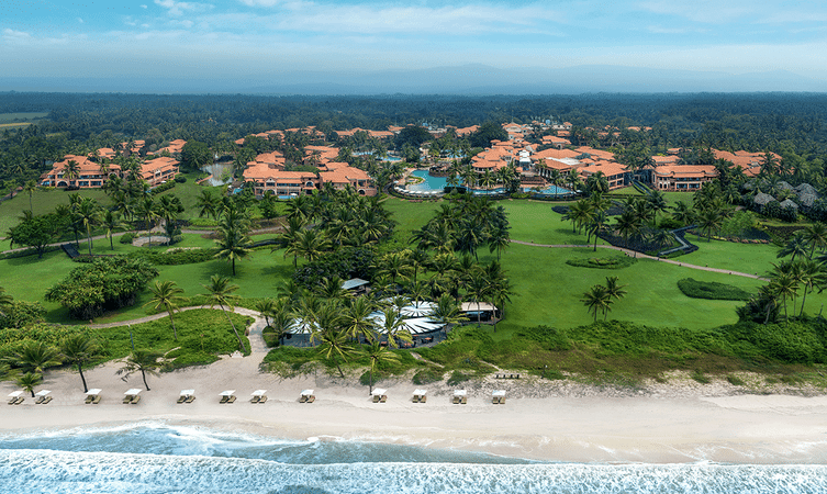 Aerial view of the resort with private beach front