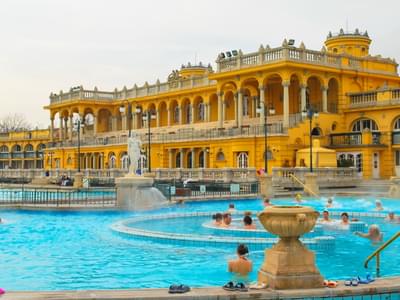 Refresh your senses in the outdoor pools of Széchenyi, surrounded by beauty and serenity