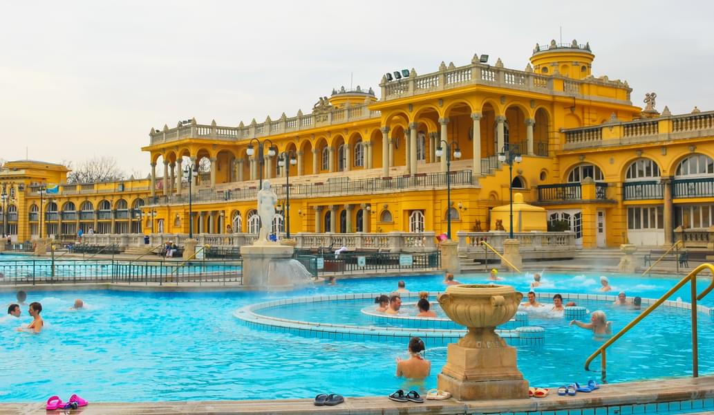Refresh your senses in the outdoor pools of Széchenyi, surrounded by beauty and serenity