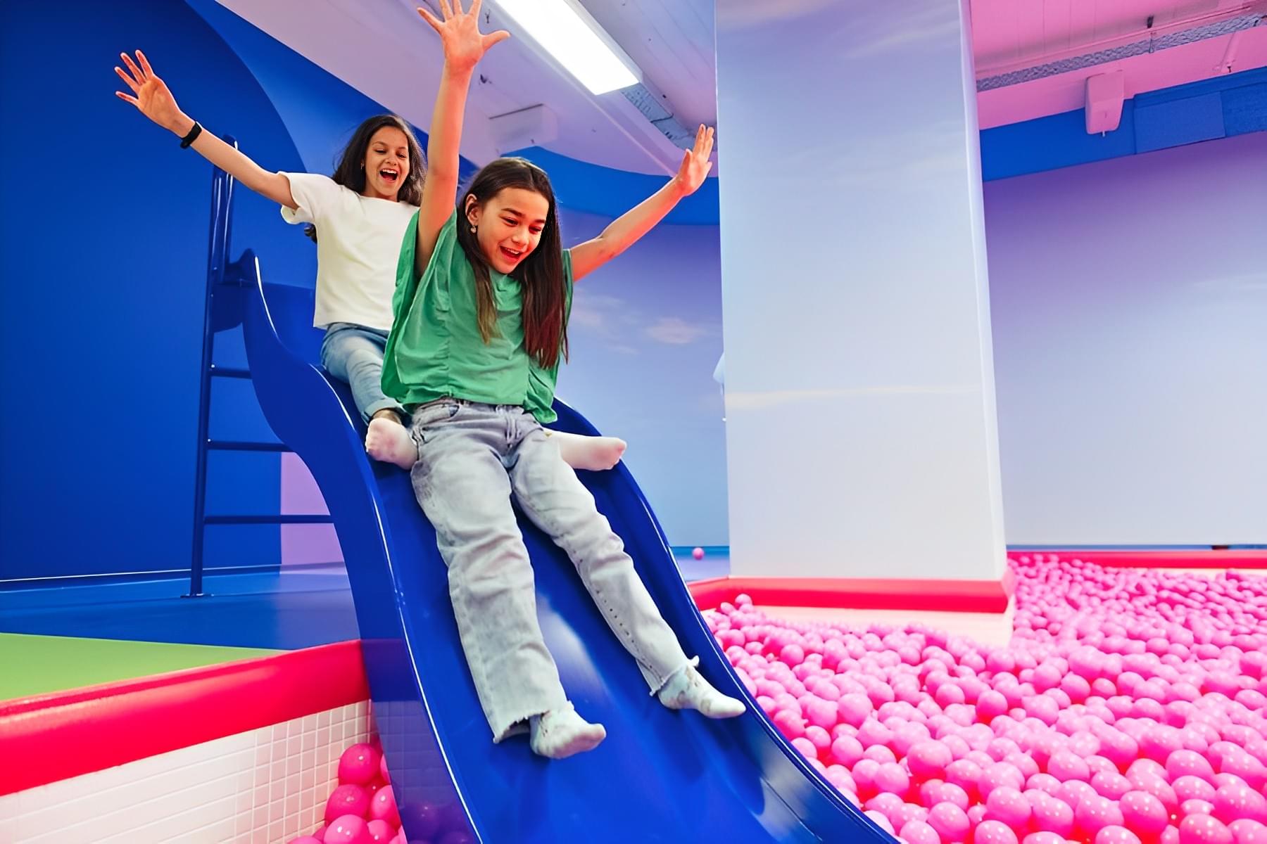 Enjoy sliding down in the pit of balls along with your friends 