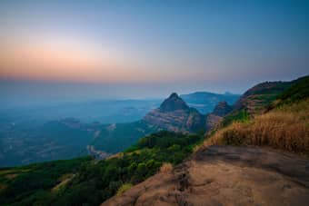 Get lost in the stunning panoramic views of Mahabaleshwar's rolling hills and lush green valleys