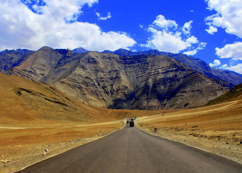 As you enjoy an impressive drive to various hotspots in Ladakh, get captivated by the astonishing rustic hills.