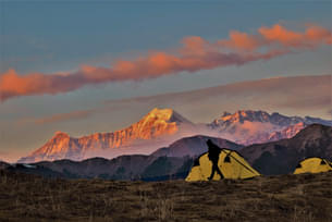 Camp at Gui & witness a sunset that paints the entire place in the brightest shade of red and orange