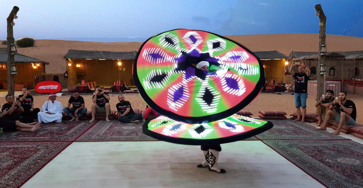 See the lively Tanura performance in the Deserts of Dubai