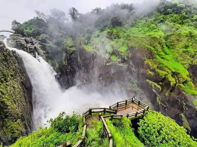 Marvel at the powerful cascade of Weinia Waterfall