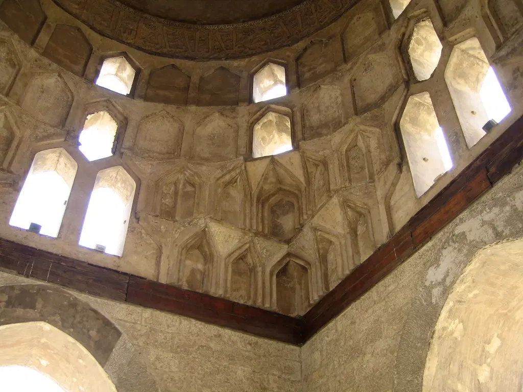 Admire the Arched Windows and Stucco Work