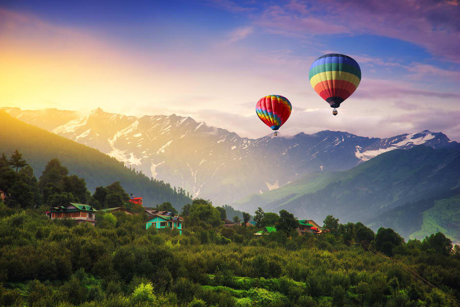 Go on a hot air balloon ride in the scenic landscape of Manali