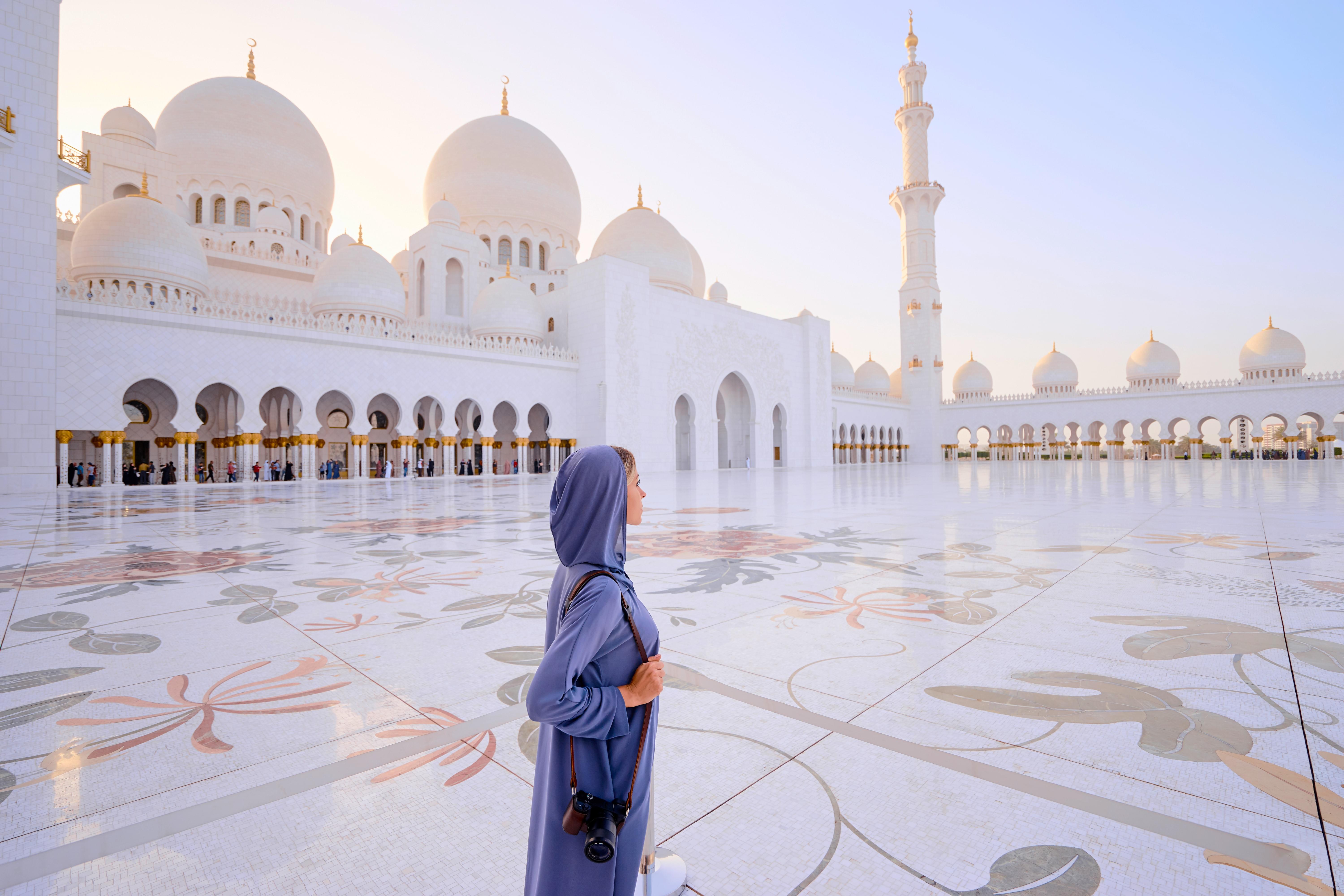 Gril admiring the Sheikh Zayed Grand Mosque