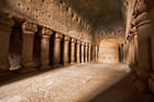 Explore the complex through long halls & carved columns