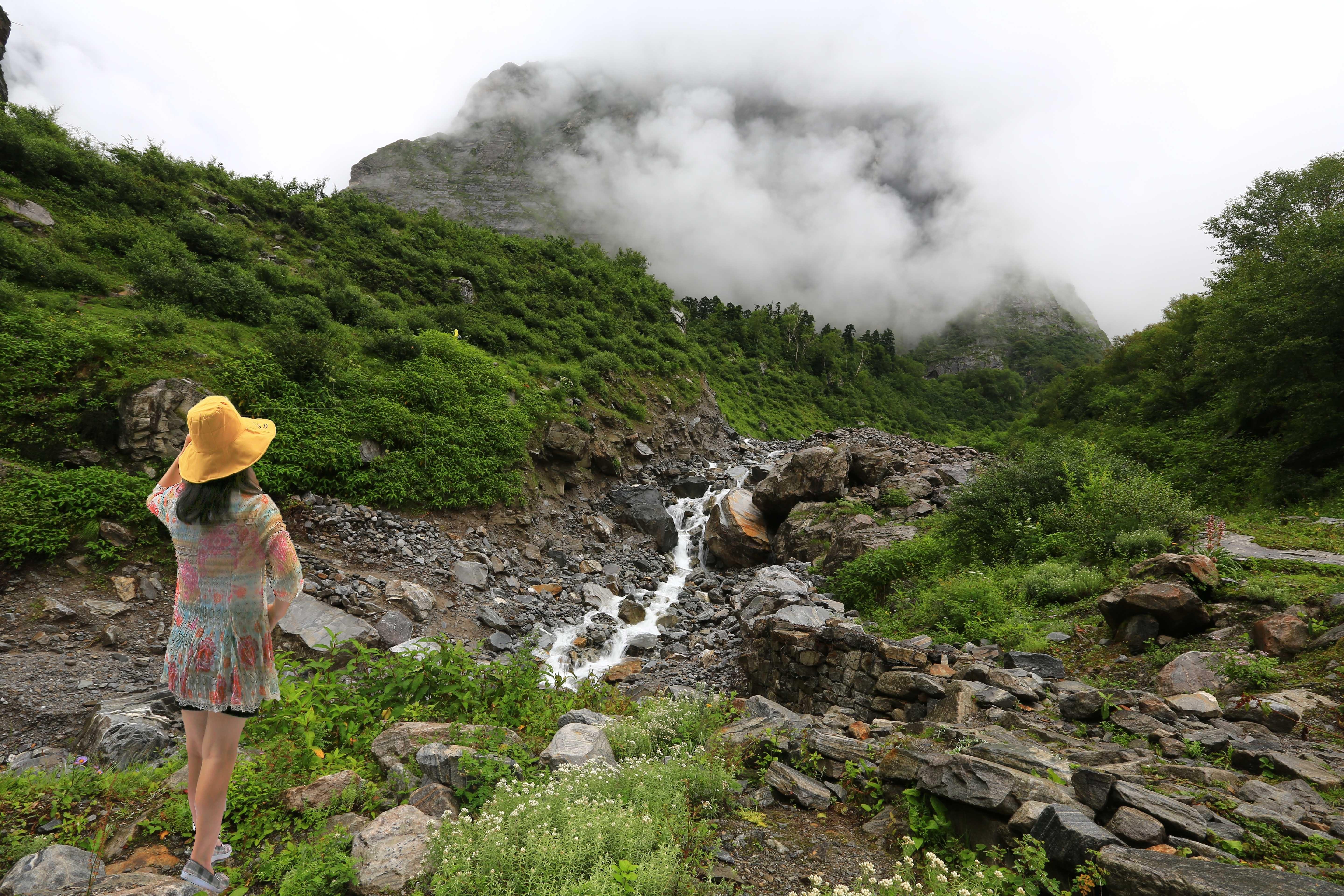 Toruisy admiring beauty of hills