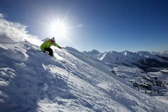 Learn skiing basics in just 10 minutes with expert guidance on Solang Valley's stunning slopes at 8,500 ft