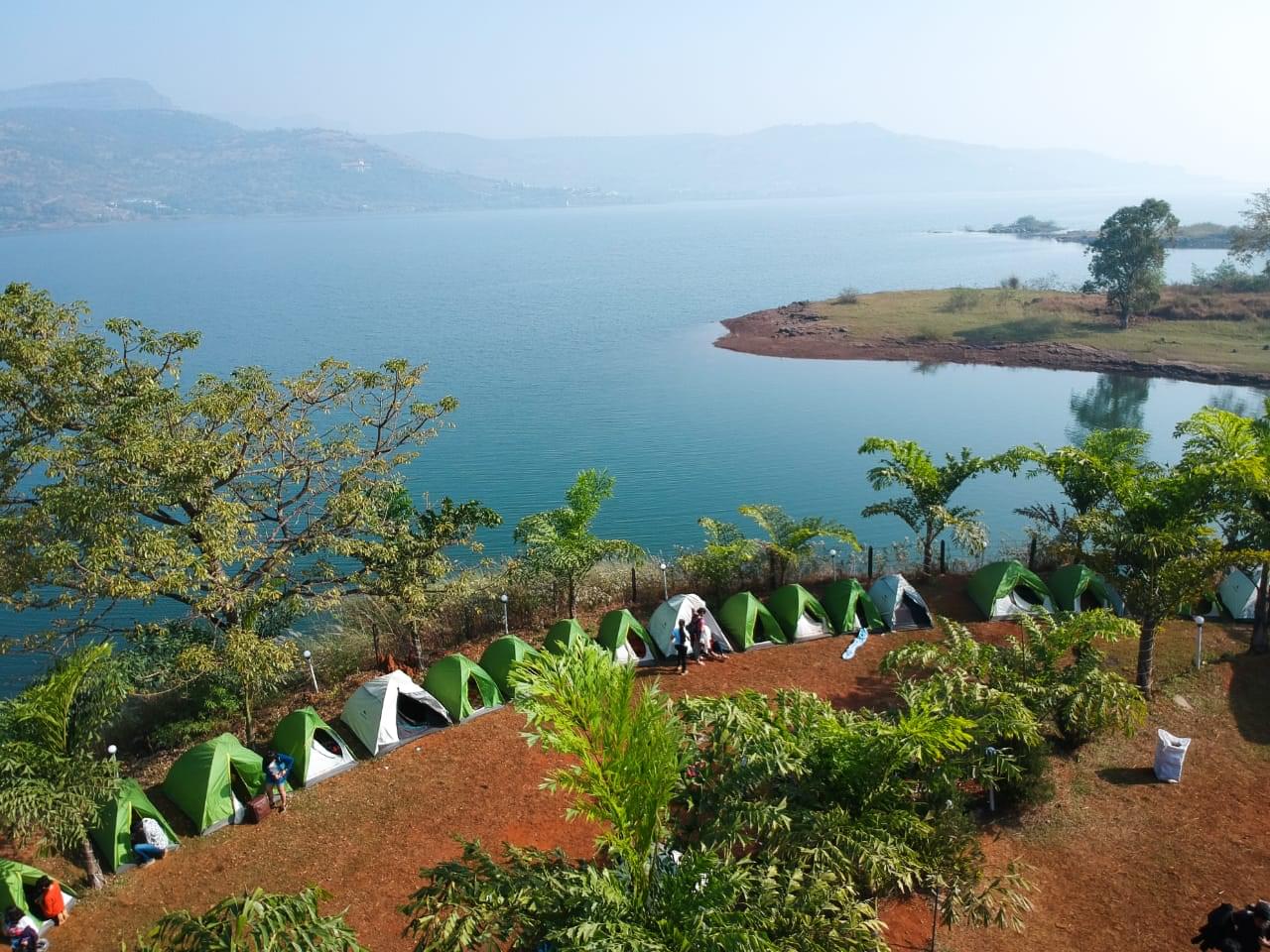 Admire the stunning aerial view of serene Pawna Lake