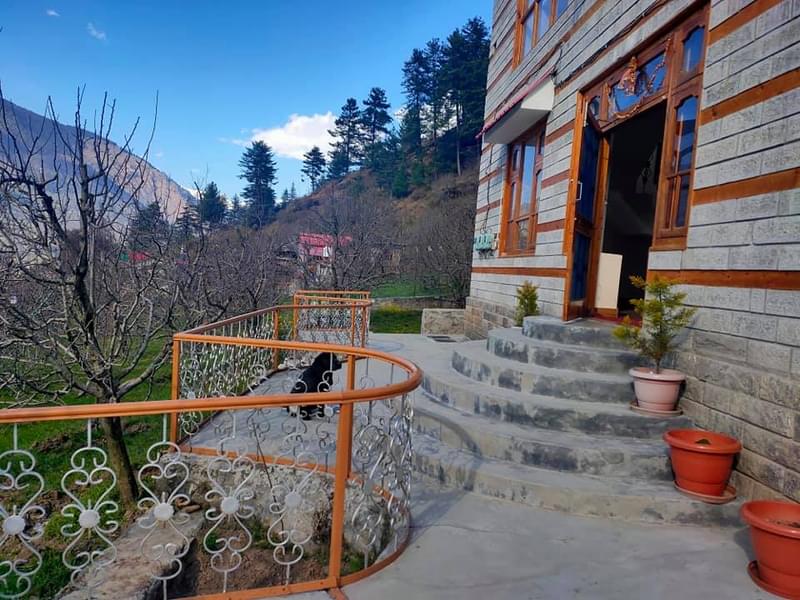 A Riverside Cottage Stay Amidst Lush Greenery In Manali Image