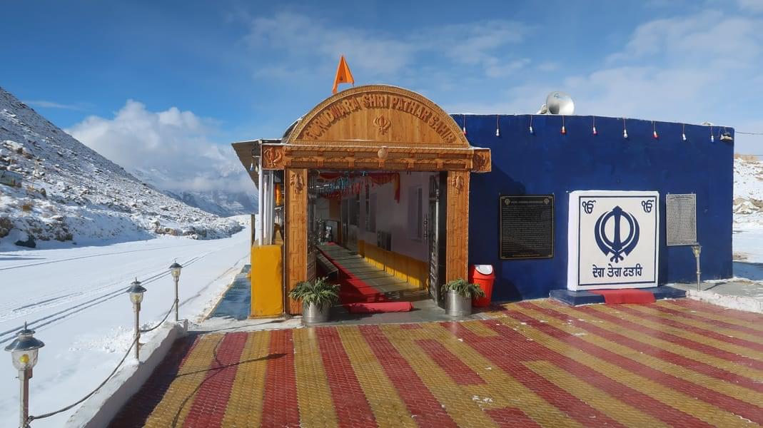 While in Ladakh, experience the peaceful and contemplative atmosphere of Gurudwara Pathar Sahib with its serene natural surroundings and spiritual energy. 