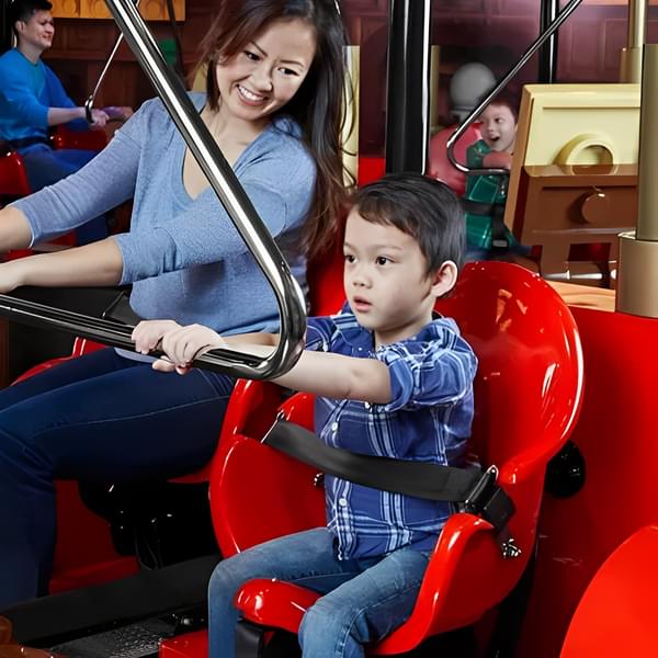 Have fun on the center's mini rides with your children