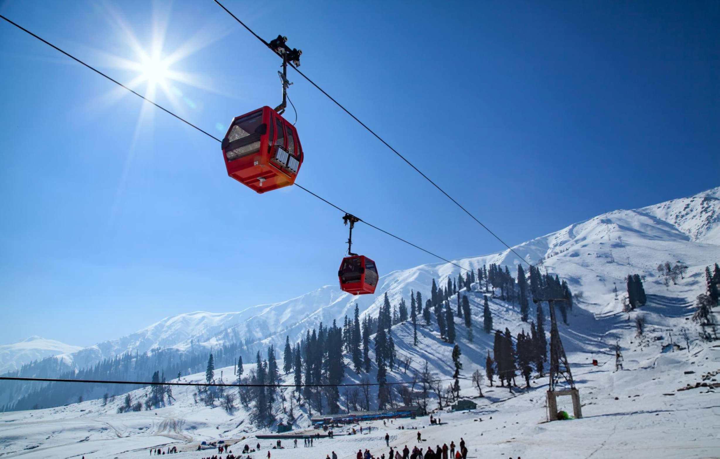 Glide over the snow-covered Gulmarg Valley on the iconic Gondola Ride