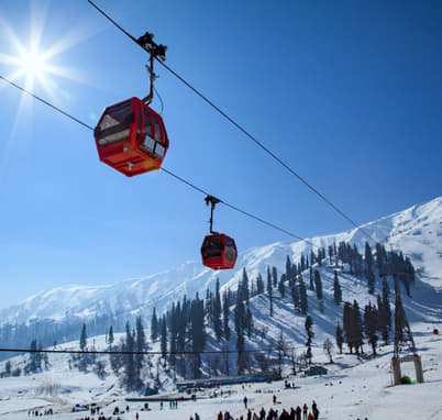 Glide over the snow-covered Gulmarg Valley on the iconic Gondola Ride