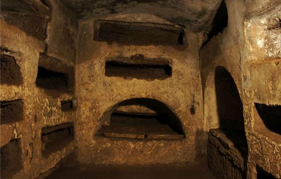 Explore these extensive tunnels lined with tombs carved right out of the rock