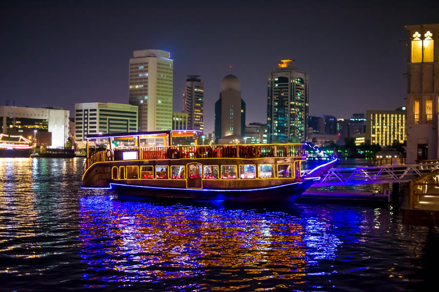 Admire the illuminated city of Dubai while partaking in a Dhow cruise ride