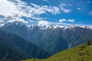 Breathe fresh mountain air and enjoy views of the snow-capped peaks far away.