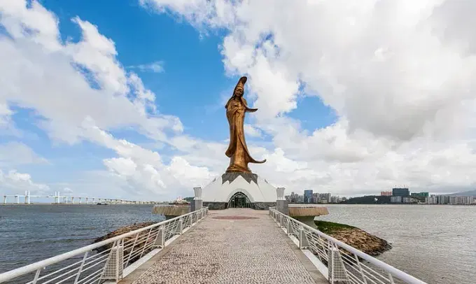 Visit Kun Iam Statue