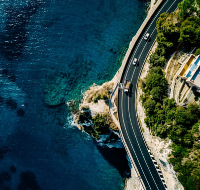 Enjoy a scenic drive through the iconic Sea Cliff Bridge
