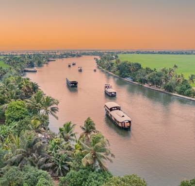 Enjoy a houseboat cruise through the backwaters of Alleppey