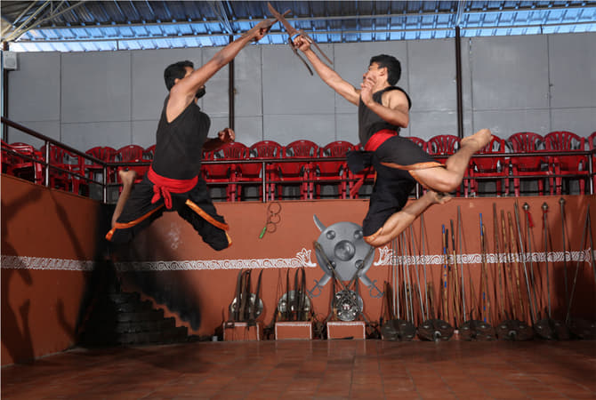 Be captivated by the agility and precision of performers showcasing ancient combat techniques