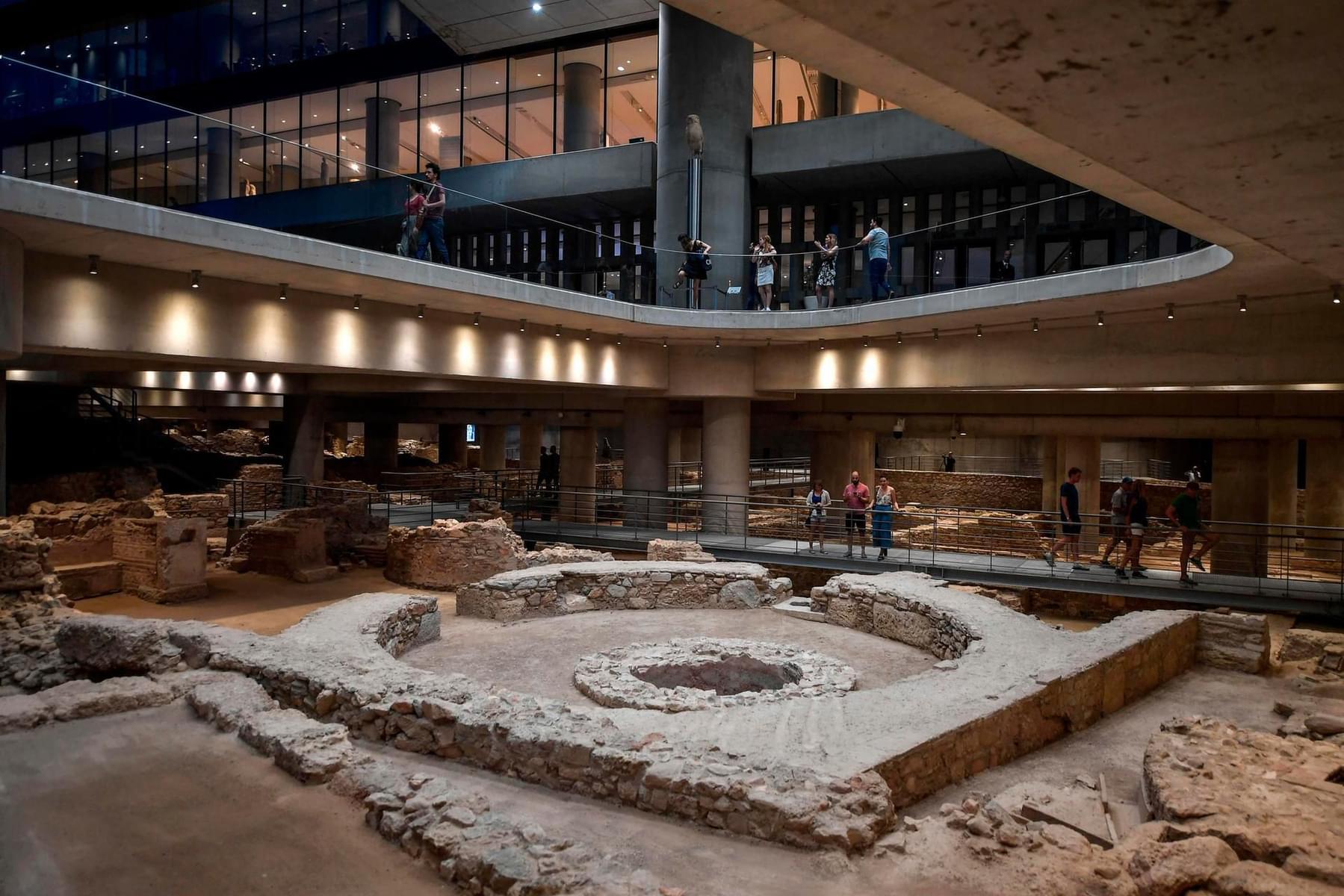 Look at the archaeological excavation in the museum
