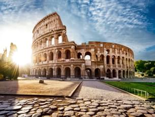 Visit the iconic Colosseum in Rome, where the echoes of ancient gladiatorial battles still resonate within its majestic walls