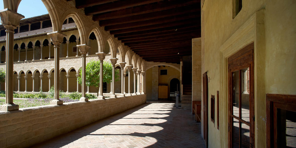 Roam around the cloister including two galleries with twenty-six columns