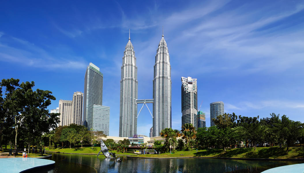 Admire the mesmerizing allure of the Petronas Twin Towers as the skyline with their awe-inspiring beauty.