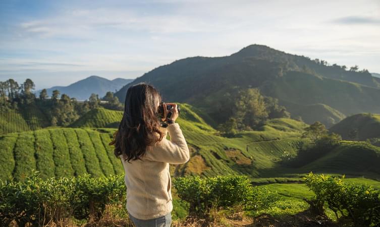 Tourist capturing images in Munnar