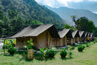 Stay in hilltop Swiss tents with breathtaking Himalayan vistas all around