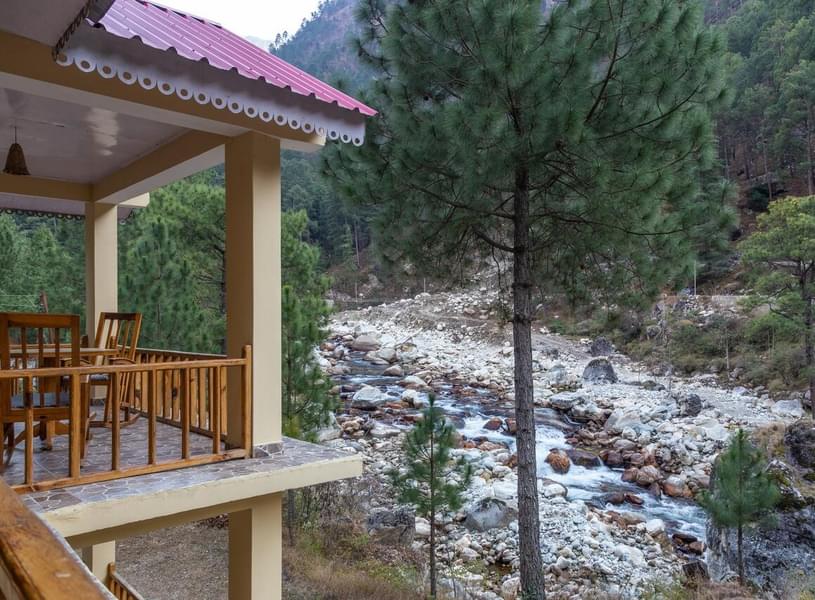 A Peaceful escape with river views in Tirthan Image