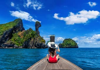 Sail to Chicken Island, known for its turquoise waters and white beaches