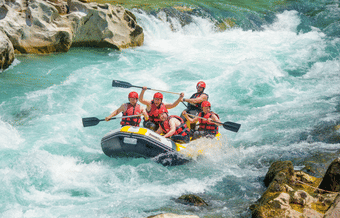 Enjoy a guided rafting session with safety equipment provided for a secure and fun experience