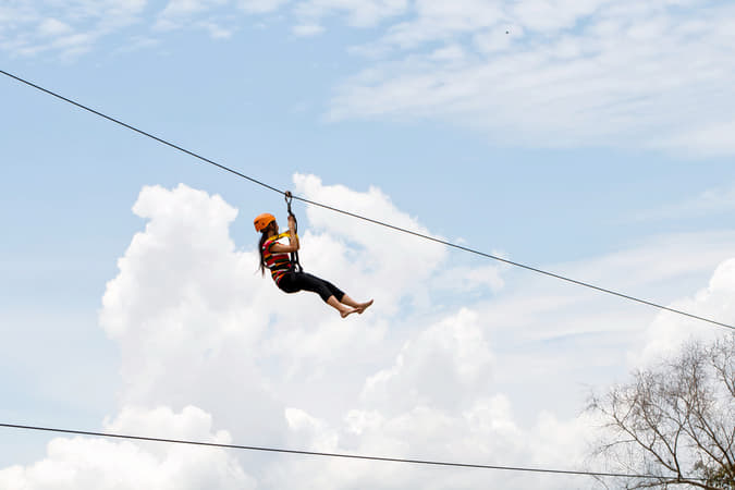 Glide 150 meters across Coorg’s lush forests, enjoying a thrilling zip-lining experience
