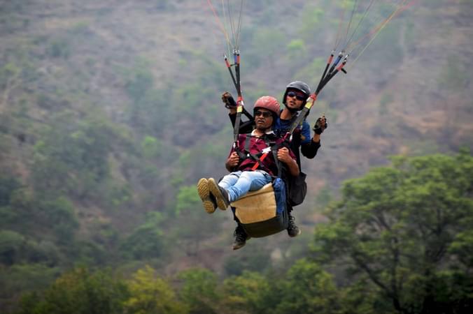 Fly above Rishikesh’s stunning green valleys