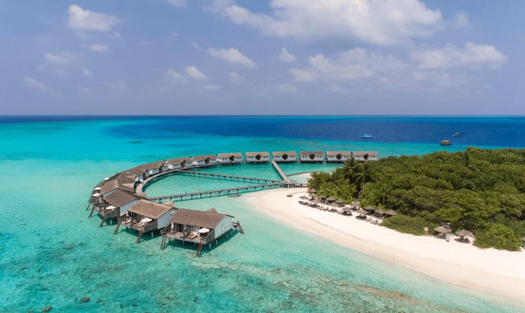 Astonishing aerial view of the Water Villas at Reethi Beach Resort