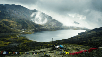 Marvel at the high-altitude Tsomgo Lake framed by the snow-capped peaks