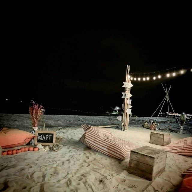 Eat food at beachside restaurants and cafes