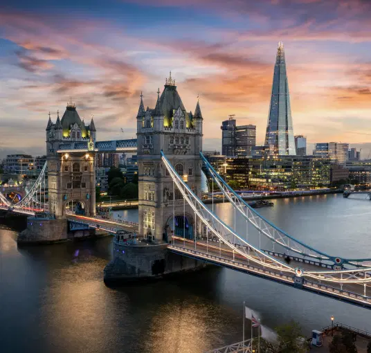 Marvel at the iconic London Tower Bridge, a masterpiece of neo-Gothic architecture that opens up to let ships pass beneath