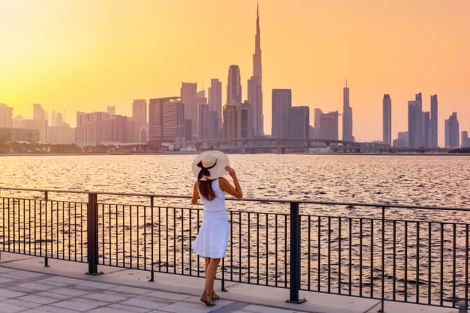 Tourist enjoying the view from Dubai Creek