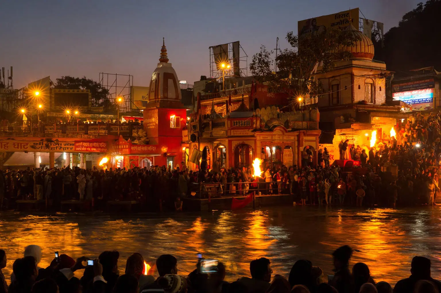 Participate in evening aarti and fire rituals