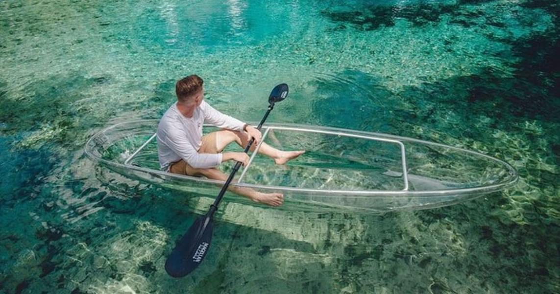 Kayak over the crystal clear water