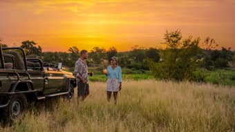 Couples enjoying sunset view of Kruger National Park, South Africa