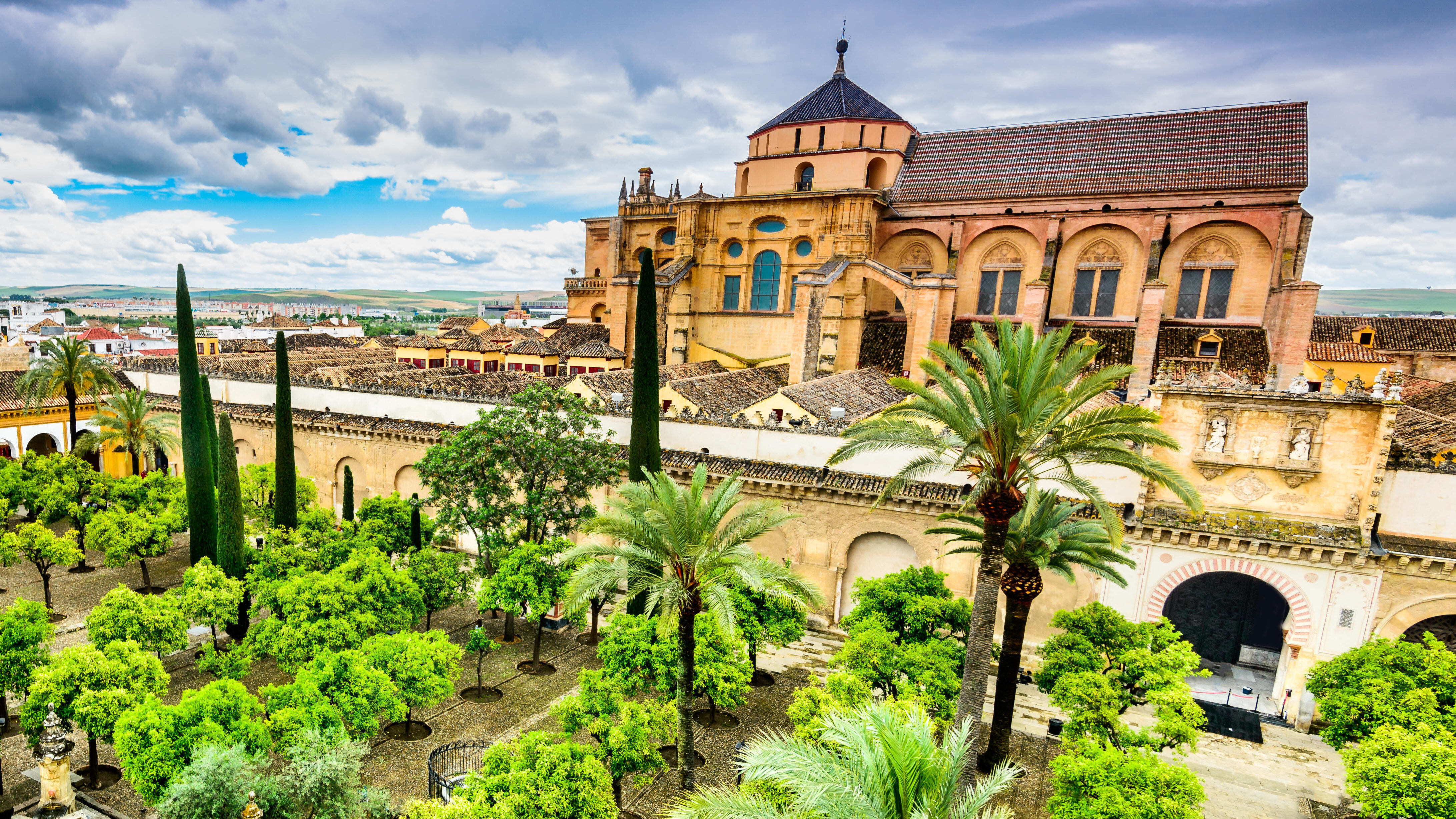 Plan a visit to the Mosque-Cathedral of Córdoba, a religious monument of Islamic world