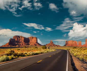 Witness Monument Valley’s sandstone giants rising from sacred Navajo desert lands
